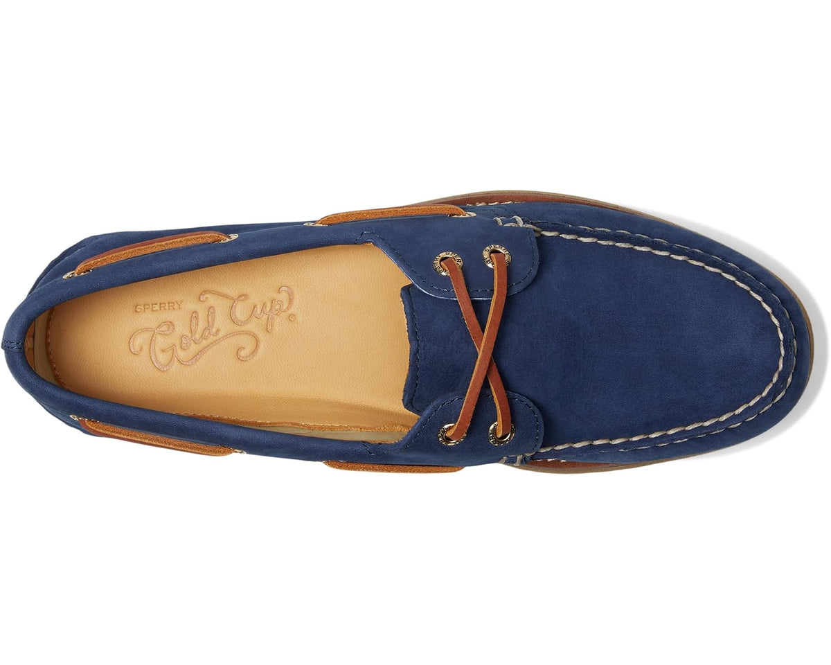 Navy suede boat shoe interior view with tan lining and lace-up eyelets