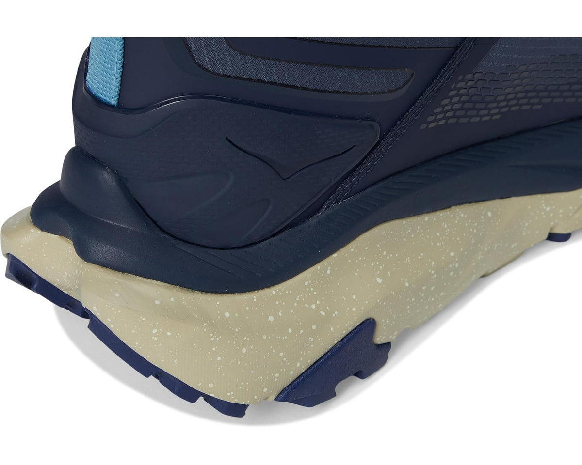Men's navy boot heel with beige speckled midsole and tread edge