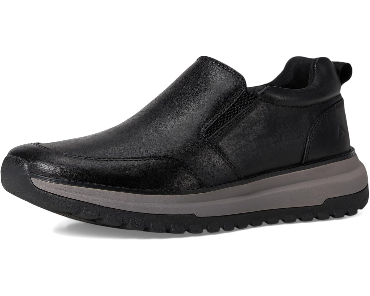 Men's black slip-on casual boot with low profile sole and padded collar