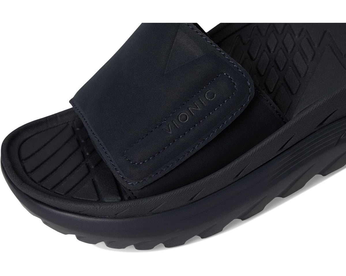 Navy synthetic nubuck slide with VIONIC-stamped strap and stitched panel