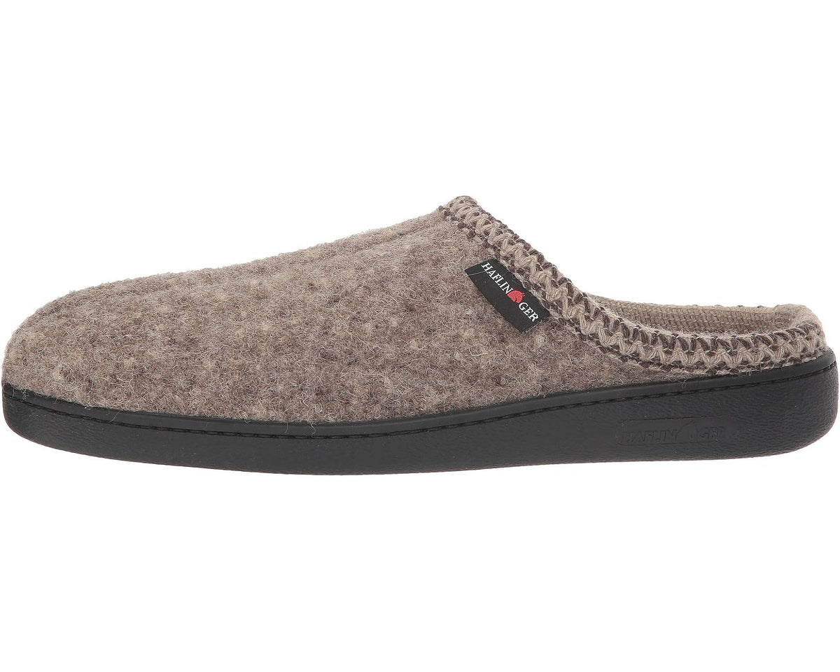 Unisex wool felt mule slipper, natural taupe side profile with stitched seam and black sole