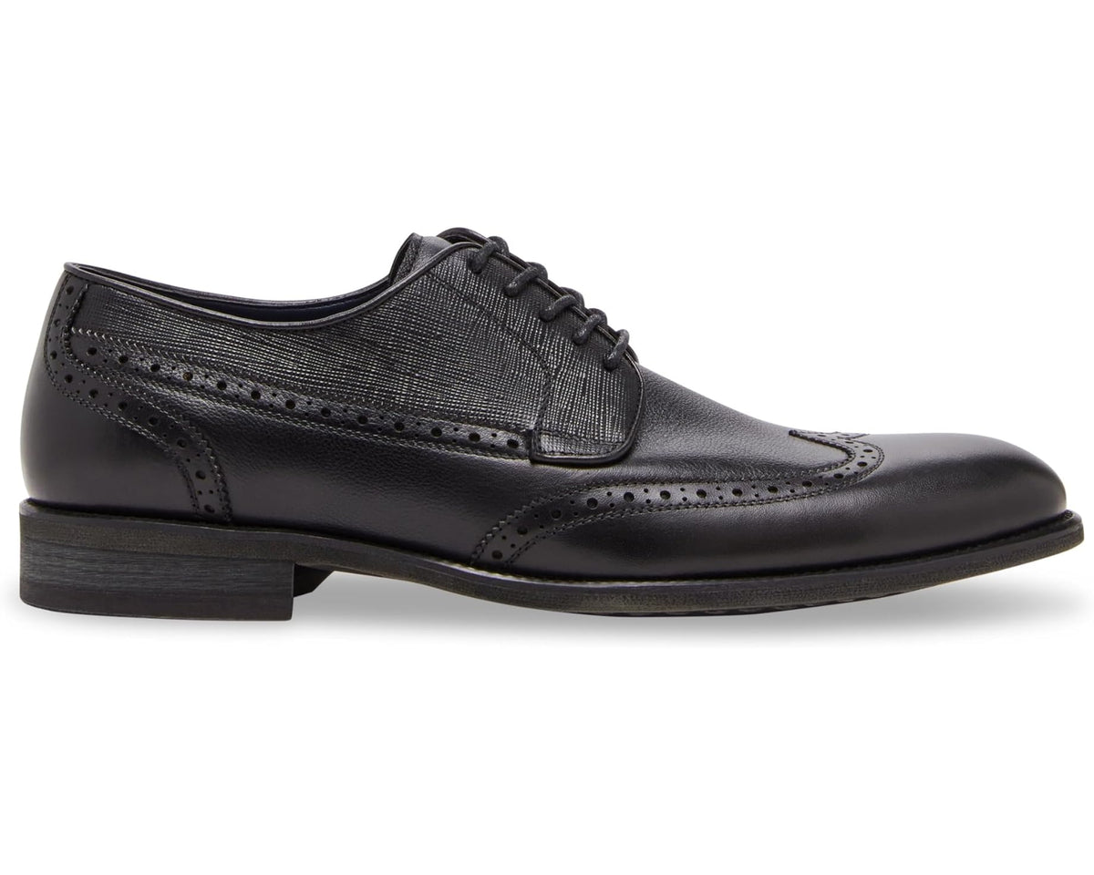 Black lace-up oxford dress shoe with cap toe, patterned side brogue, low heel