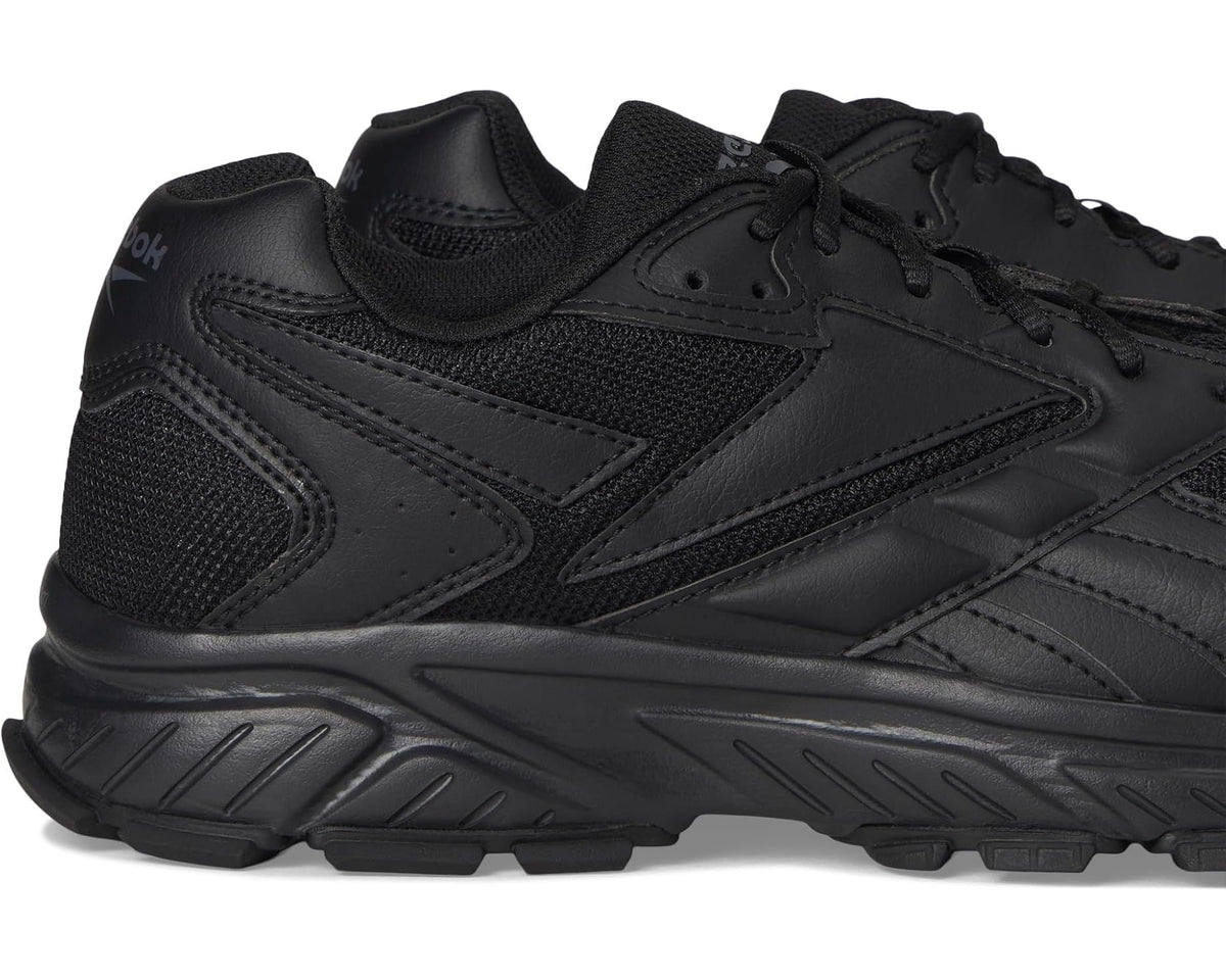 Men's black Reebok work shoe close-up, lace-up with layered panels and cushioned midsole