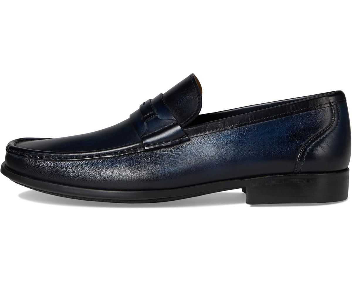 Navy leather penny-style loafer with strap detail and low block heel