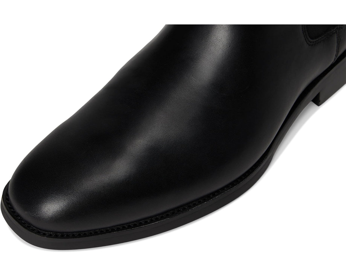 Black leather Chelsea boot upper with smooth toe and stitched sole edge