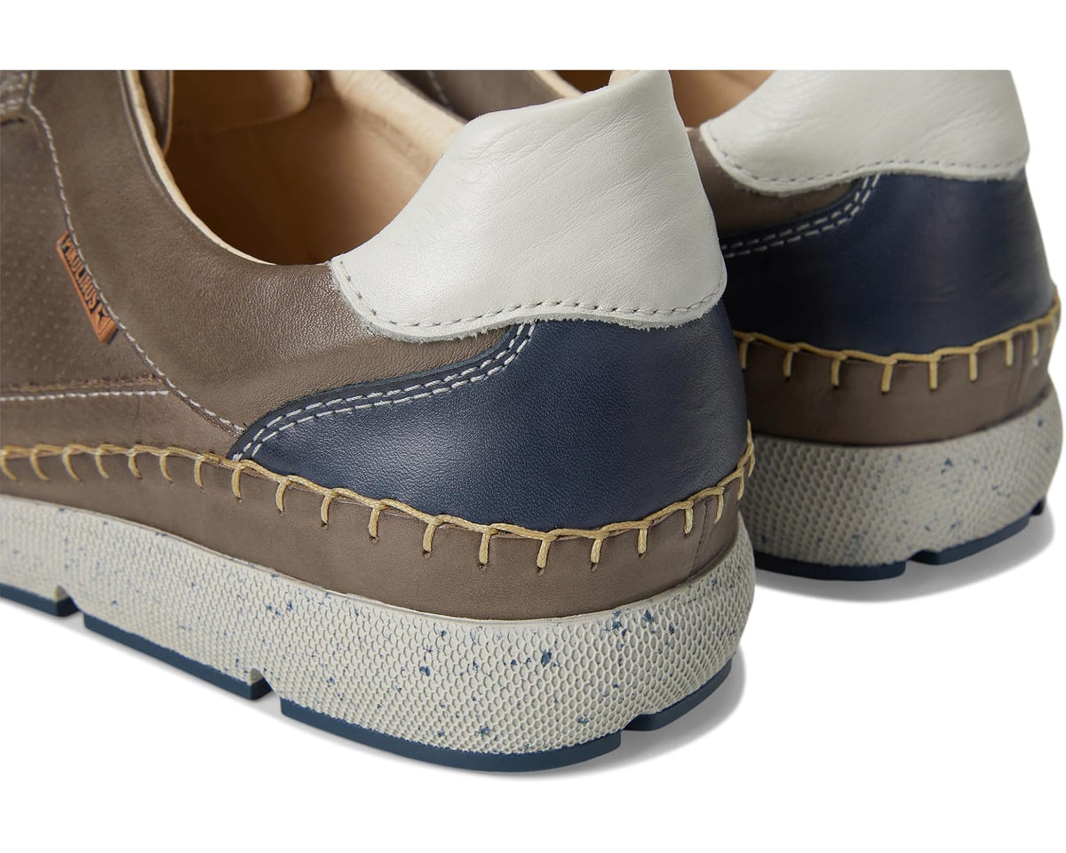 Men's PIKOLINOS sneaker heel detail with blue rear panel and textured sole