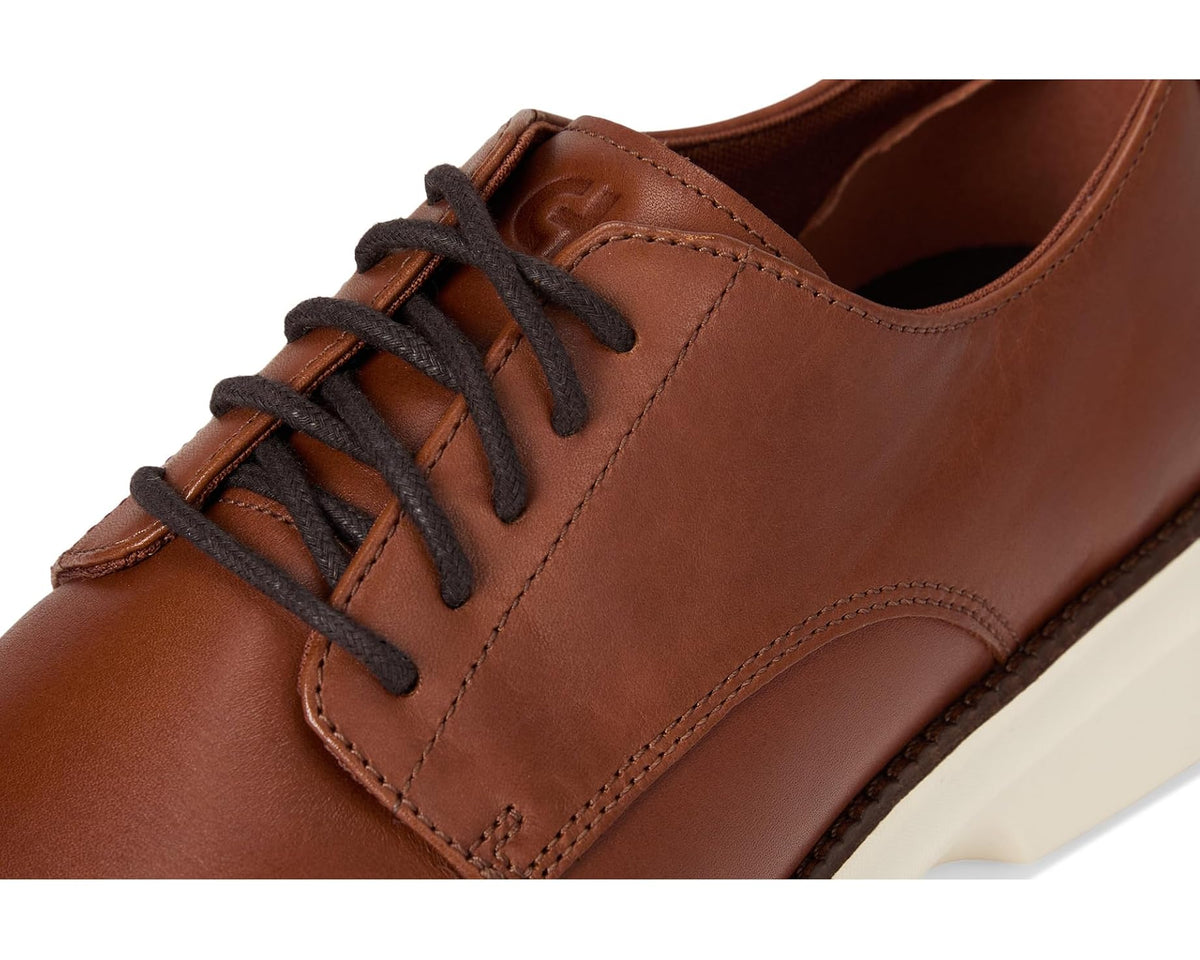 Brown Oxford laces and stitched vamp detail with cream midsole