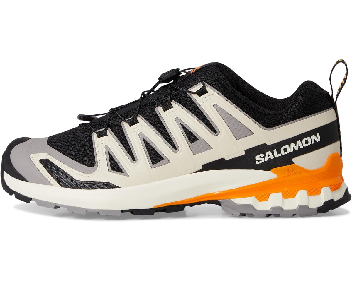 Men's trail running shoe side view in black, gray, and orange with lace-up closure.