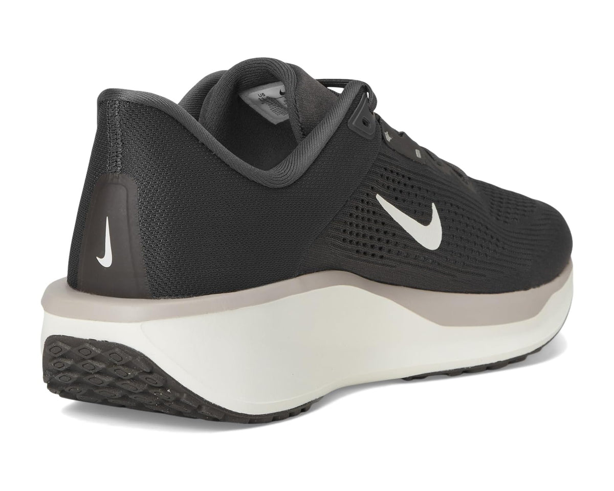 Men's black running shoes with mesh heel panel, white swoosh, lace-up.
