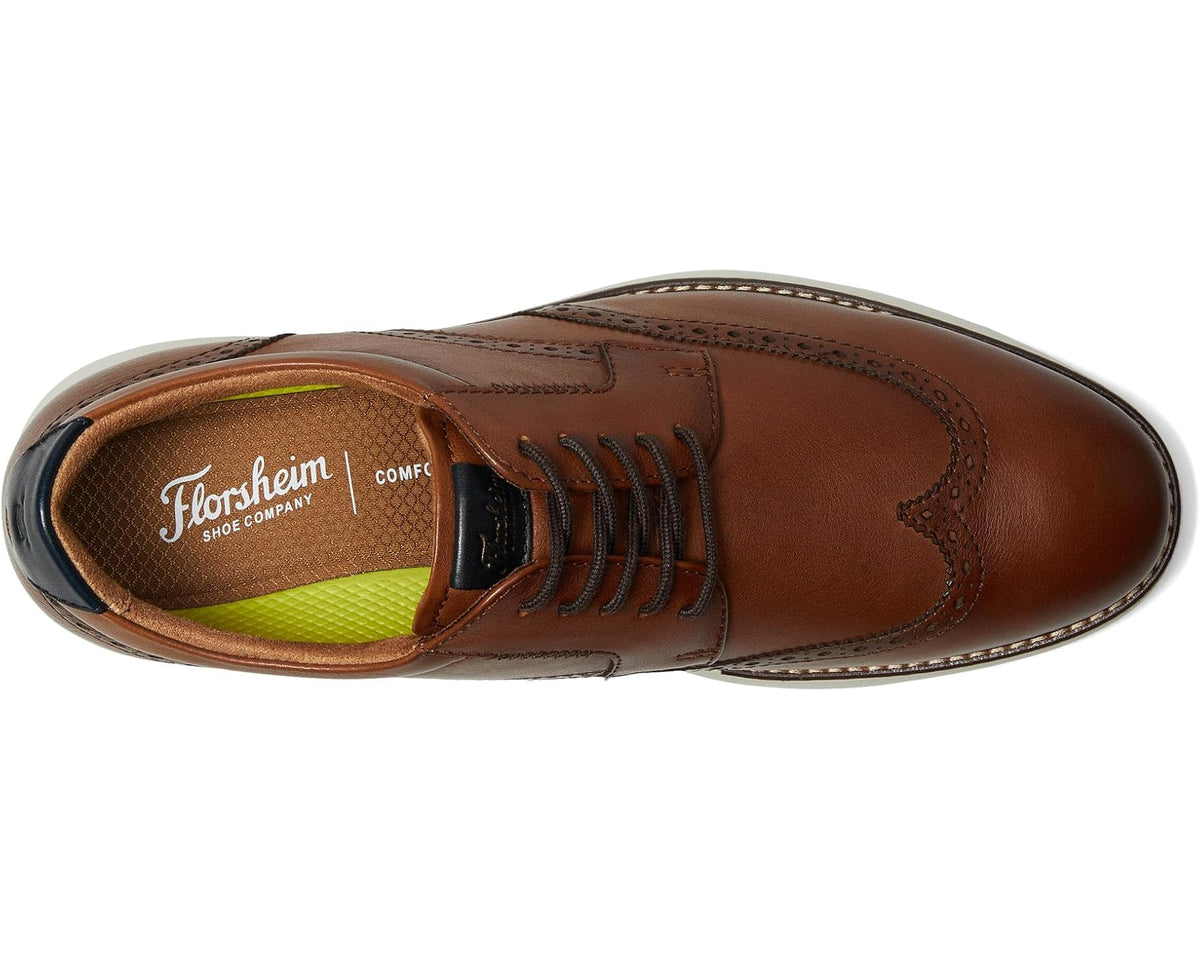 Cognac brown lace-up Oxford shoe with wingtip detailing and cushioned insole.