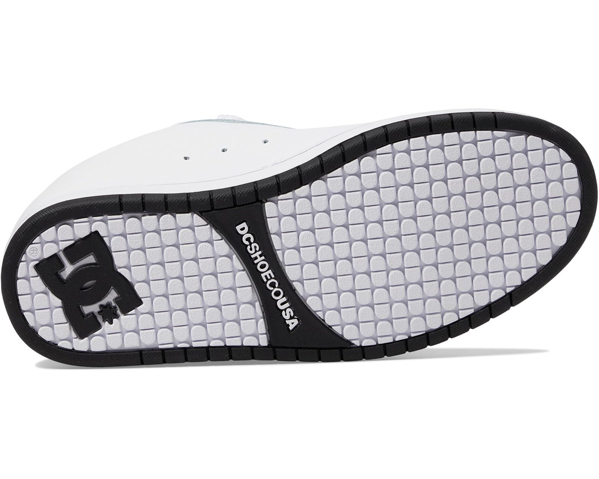 Shoe outsole with textured grip pattern, black border, and white grid tread