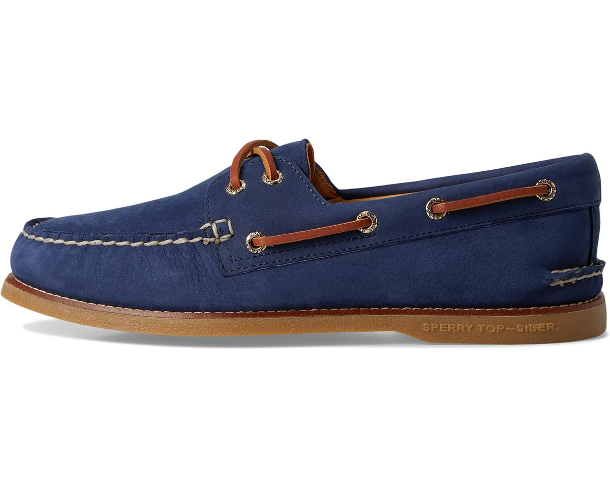 Navy suede 2-eye boat shoes with brown eyelet trim and tan rubber sole