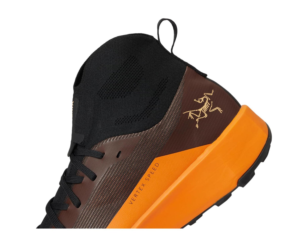 Arc'teryx Vertex Speed boot, close-up of black collar, ginger upper and orange midsole