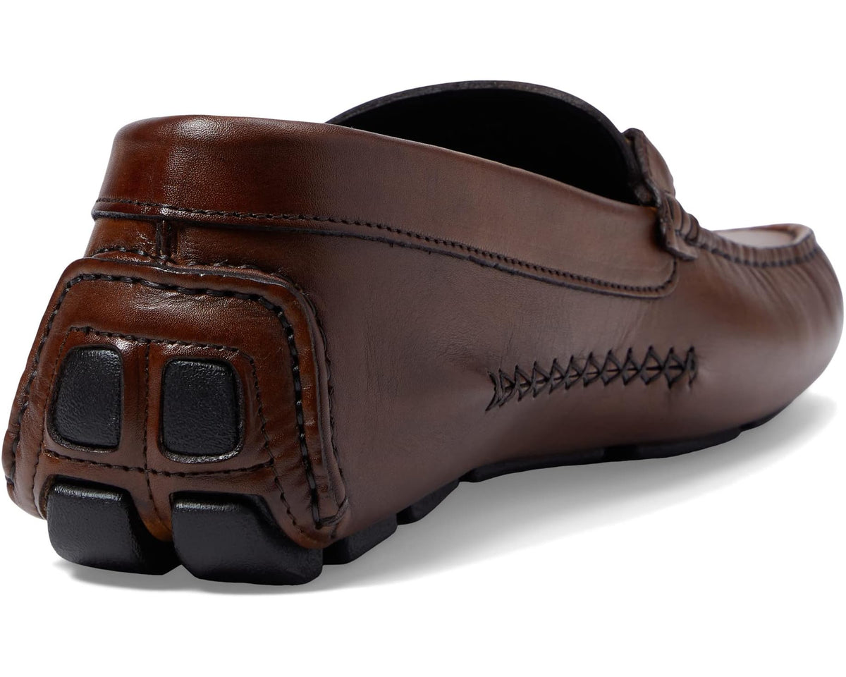 Brown leather loafer heel with decorative logo stitching and rubber sole