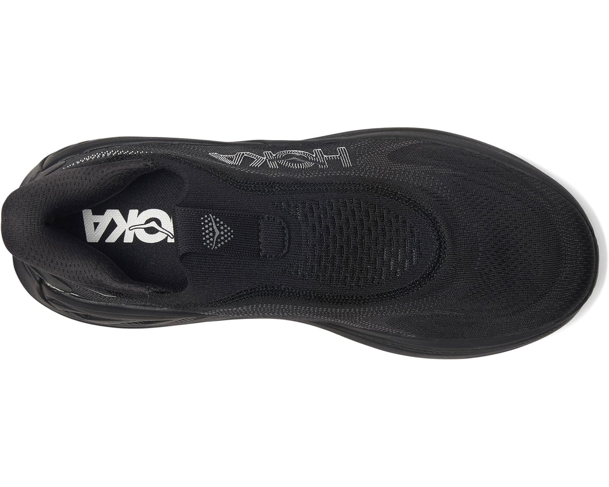 Black laceless shoe interior view with HOKA logo on mesh upper and cushioned insole