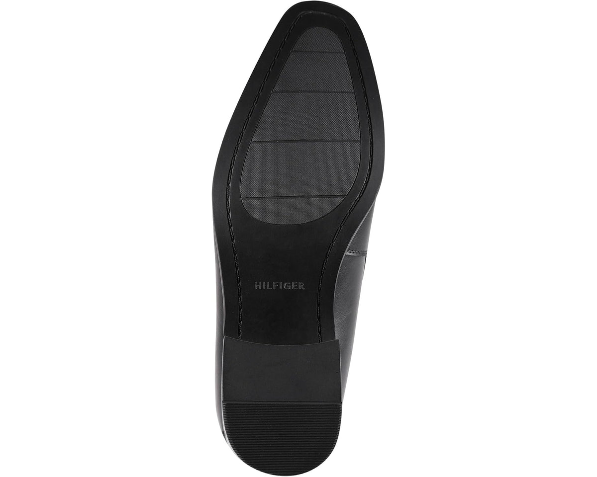 Black leather loafer sole with tread and sidewall stitching