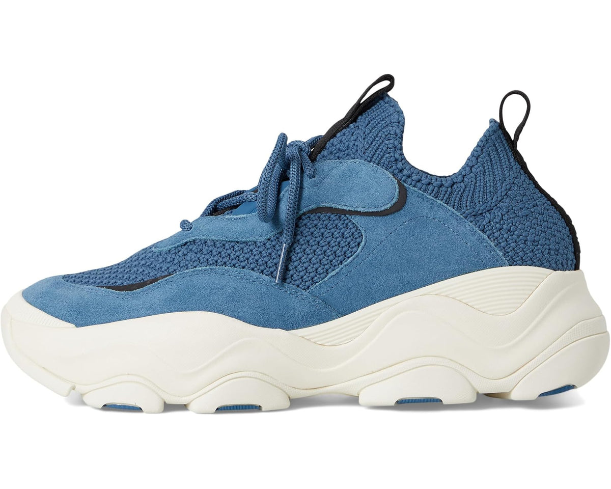 Atlas knit trainer sneaker in dark chambray blue with lace-up top and cream sole