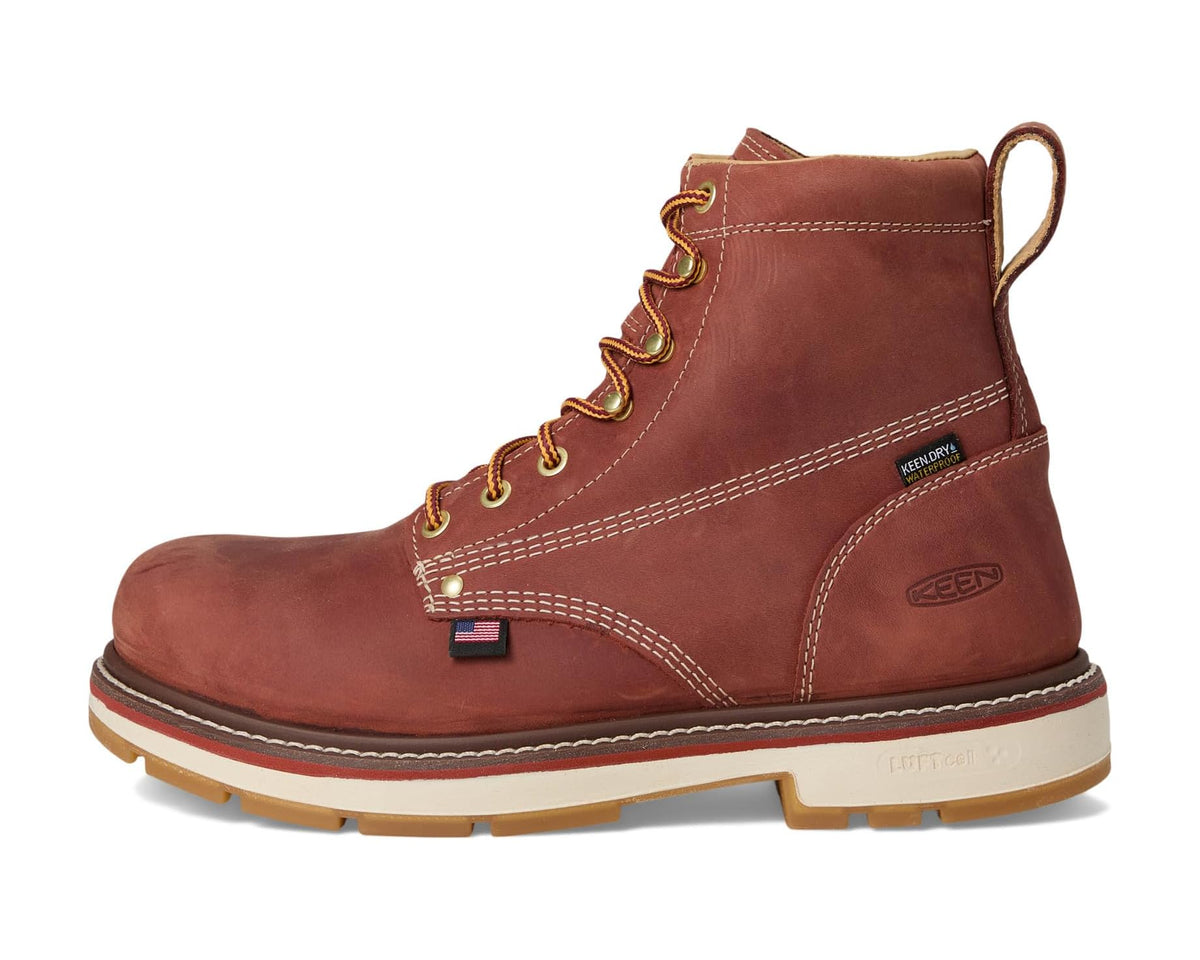 Men's brown high-top work boot with yellow laces, padded collar, and pull tab