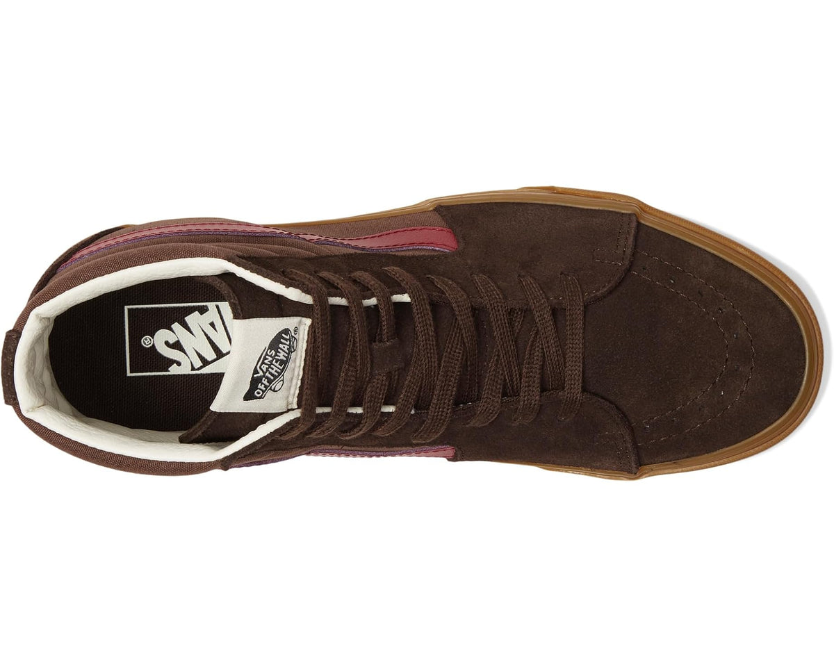 Vans high-top sneakers, brown suede upper with red side stripe, lace-up view