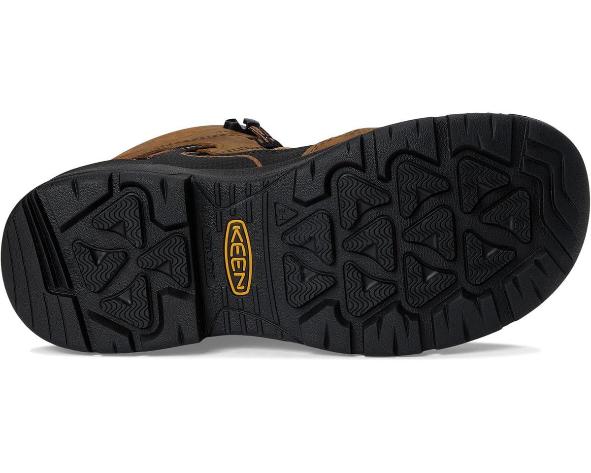 Men's KEEN waterproof boot outsole with rugged tread, black and tan