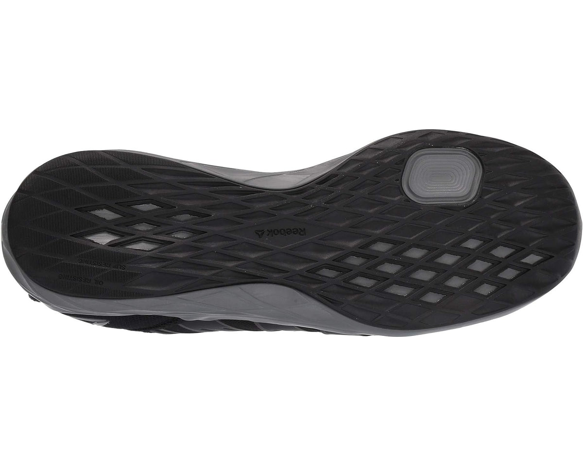Black work shoe outsole with herringbone tread pattern and gray traction pods