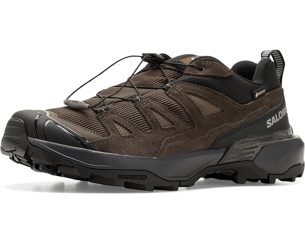 Men's Salomon mid-top hiking shoes in dark earth with black accents, lace-up