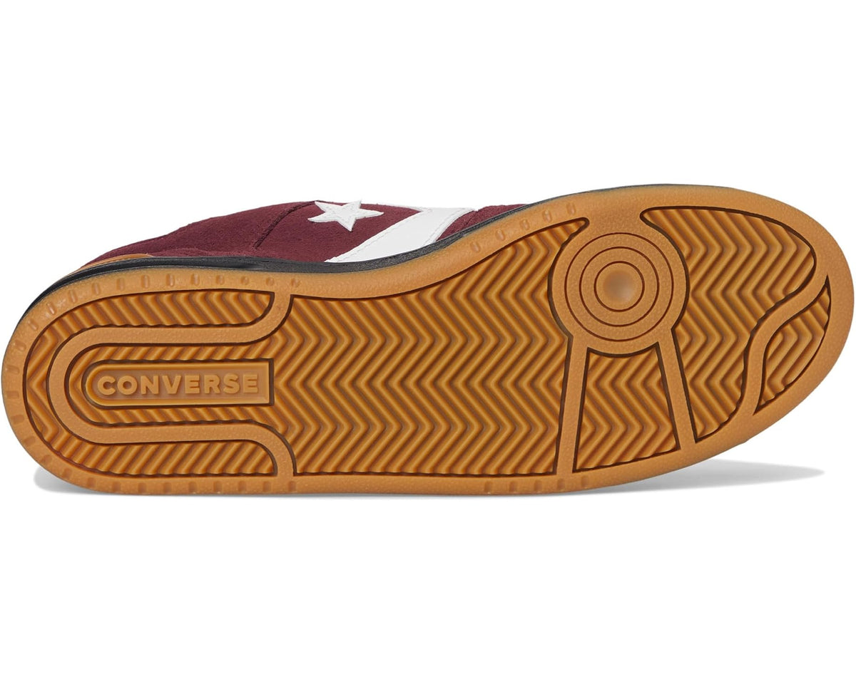 Burgundy suede sneaker outsole with herringbone tread and Converse logo