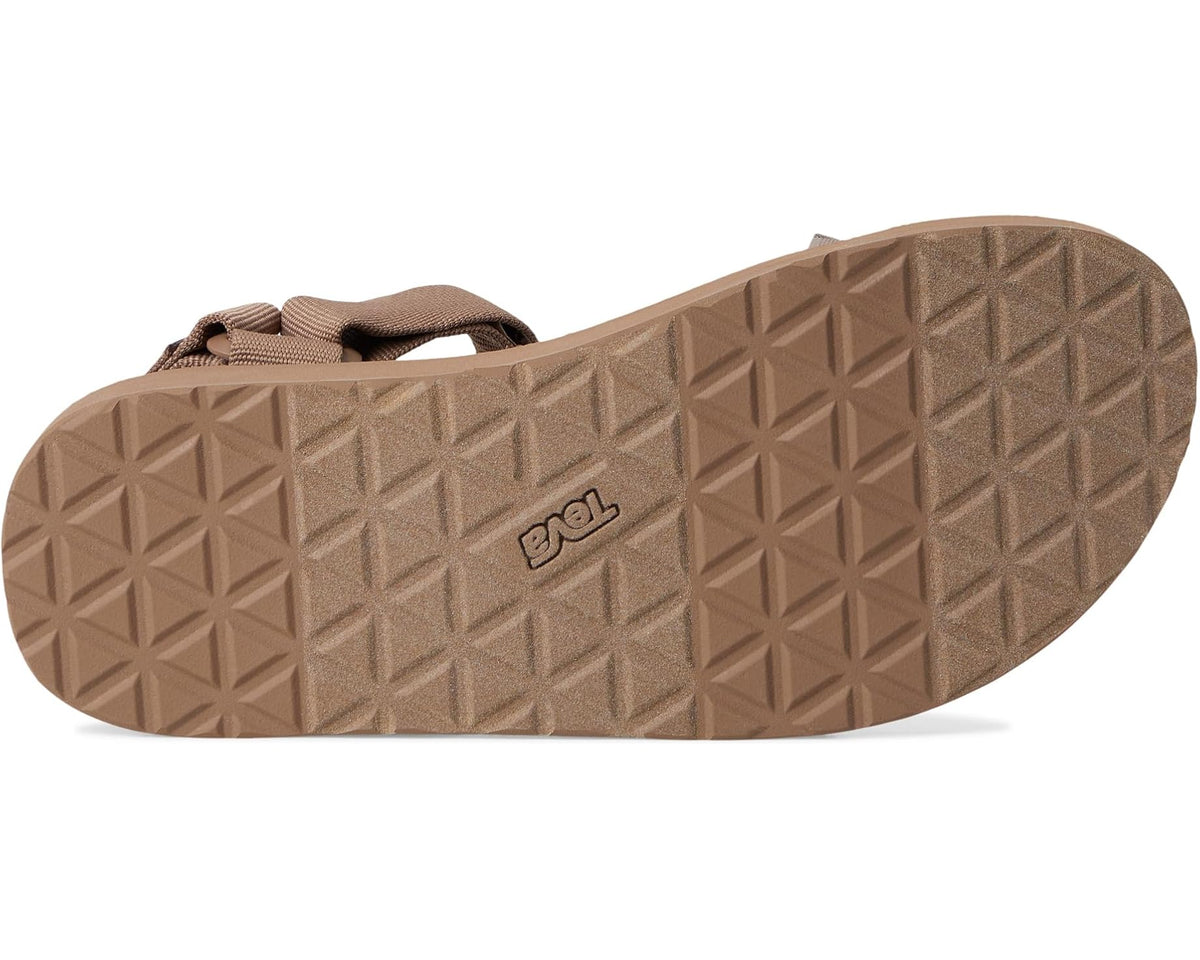Caribou rubber outsole with tread pattern and Teva logo; sandals heel view