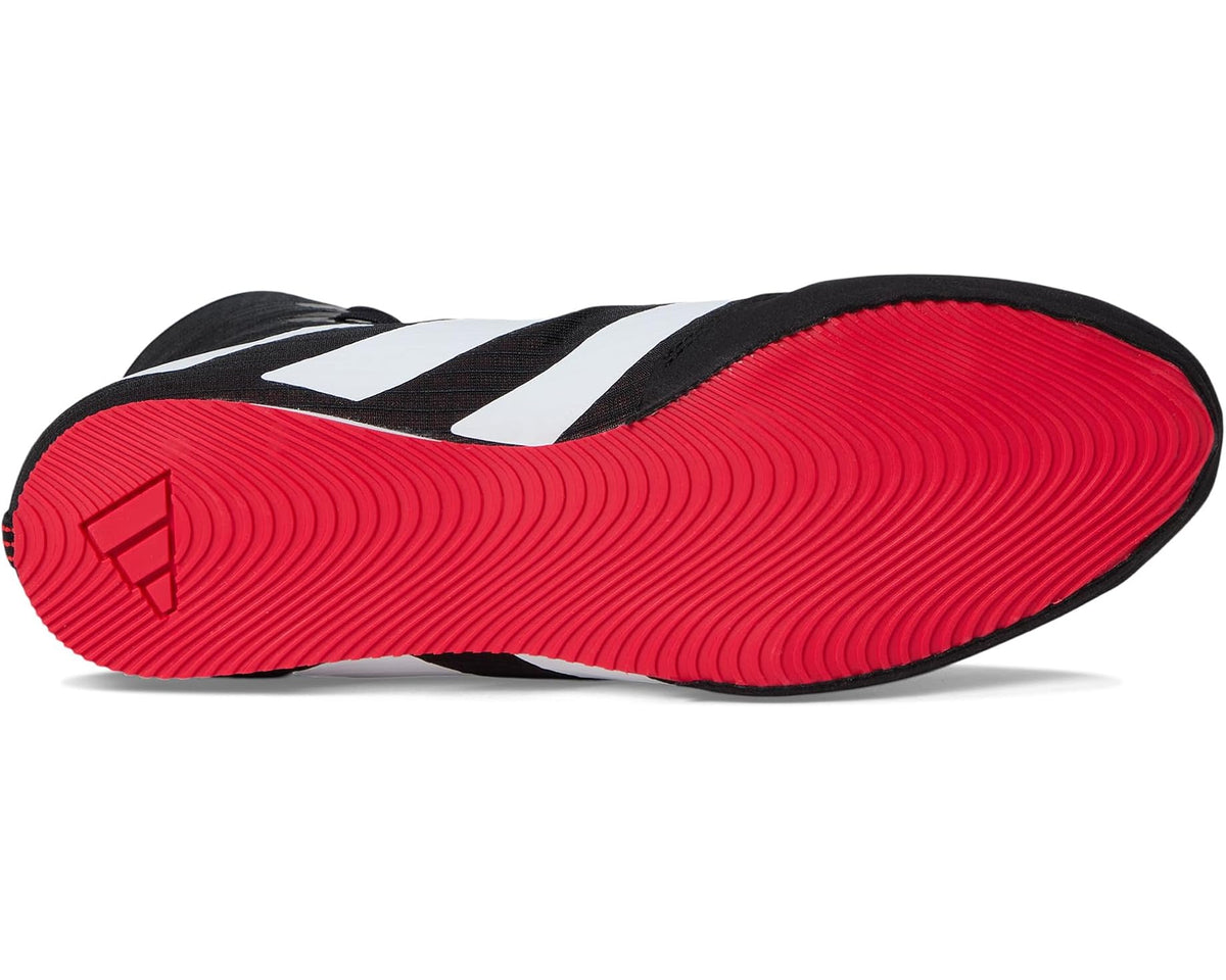 Unisex adidas high-top shoe outsole with red tread and black heel