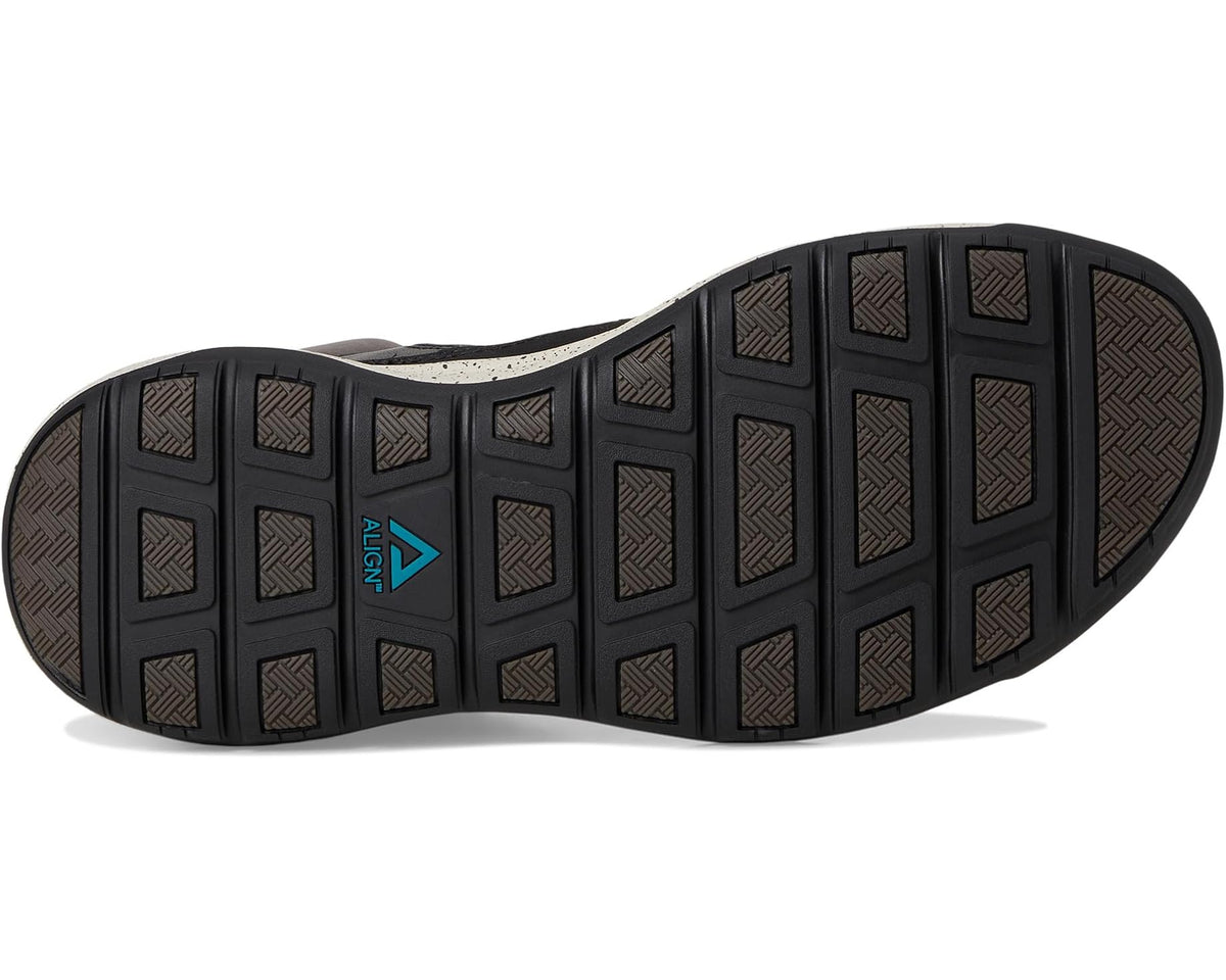 High-top sneaker outsole with textured tread and blue logo mark