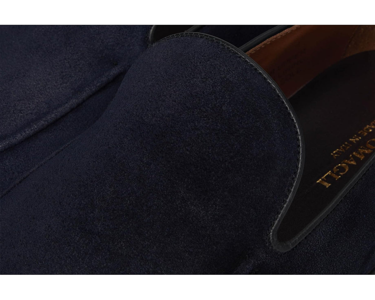 Navy suede loafer vamp close-up with Bruno Magli branding