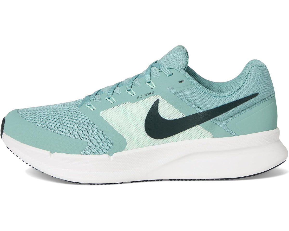 Teal men's running shoes with black swoosh, low-profile lace-up upper