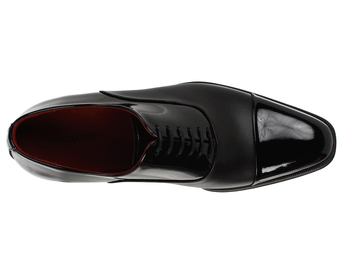 Black patent leather lace-up oxford dress shoe, side view with stitched detailing