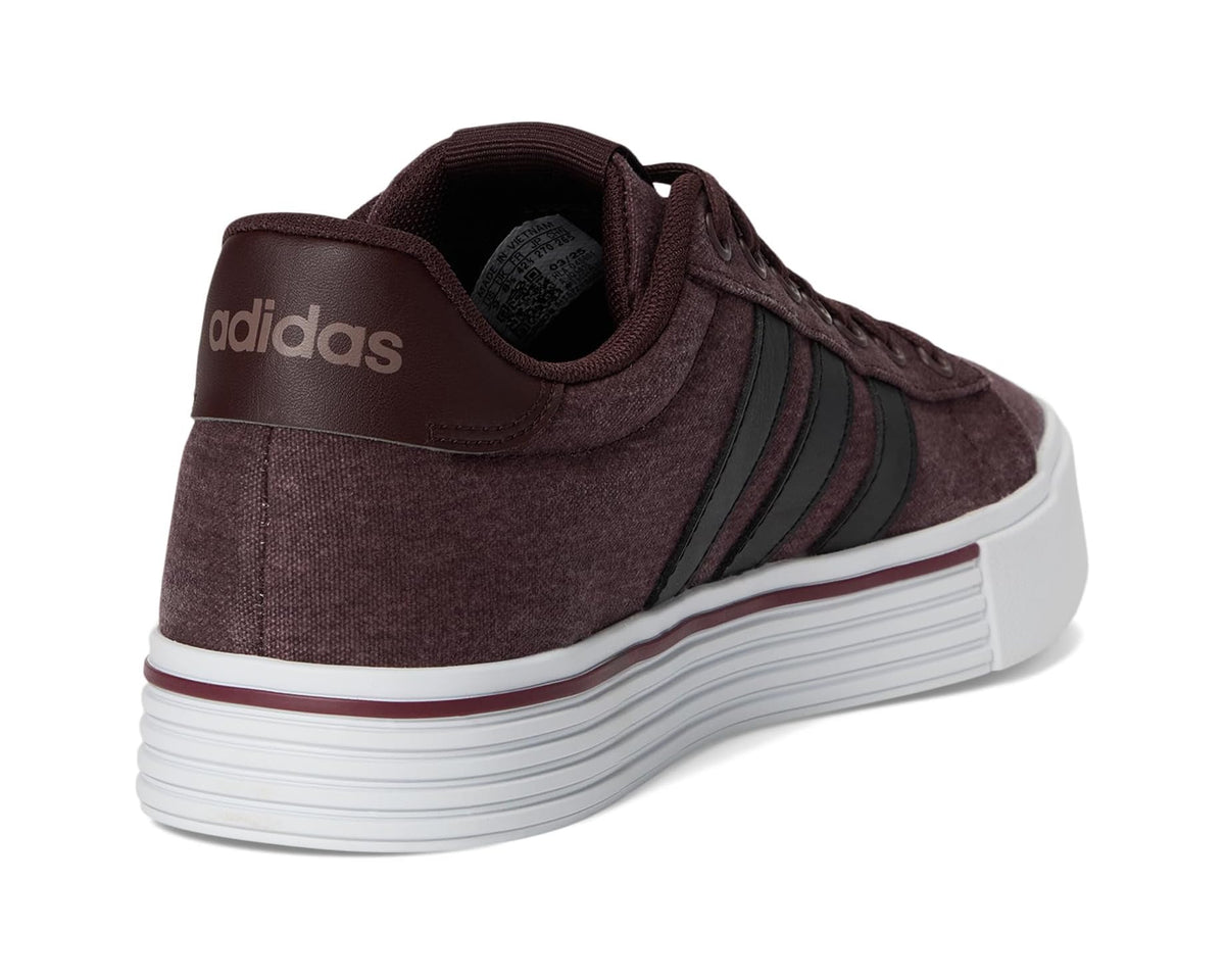 Unisex adidas sneakers with dark brown heel panel, black stripes, and white midsole