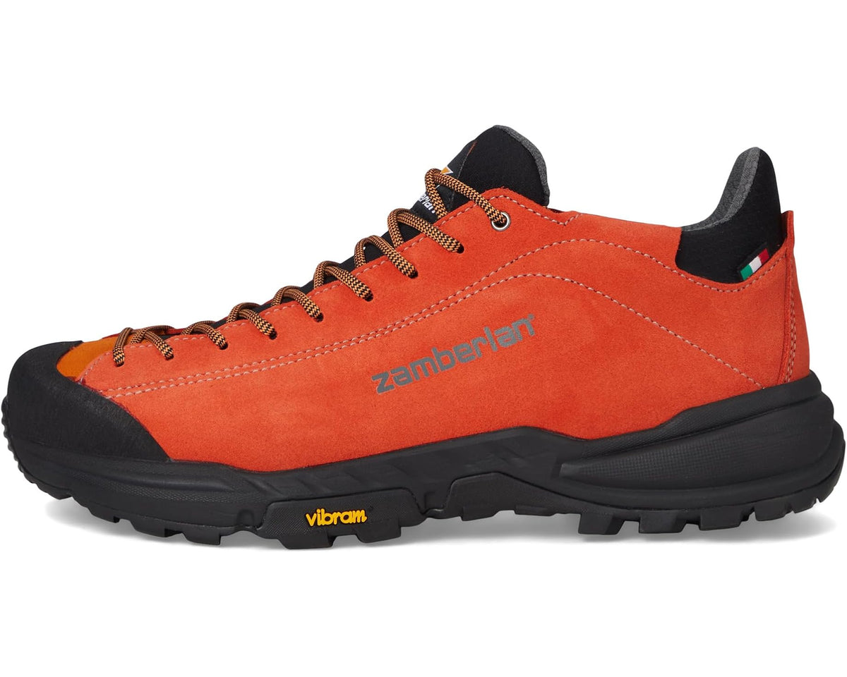 Men's orange suede hiking shoe side view with lace-up eyelets, Zamberlan branding