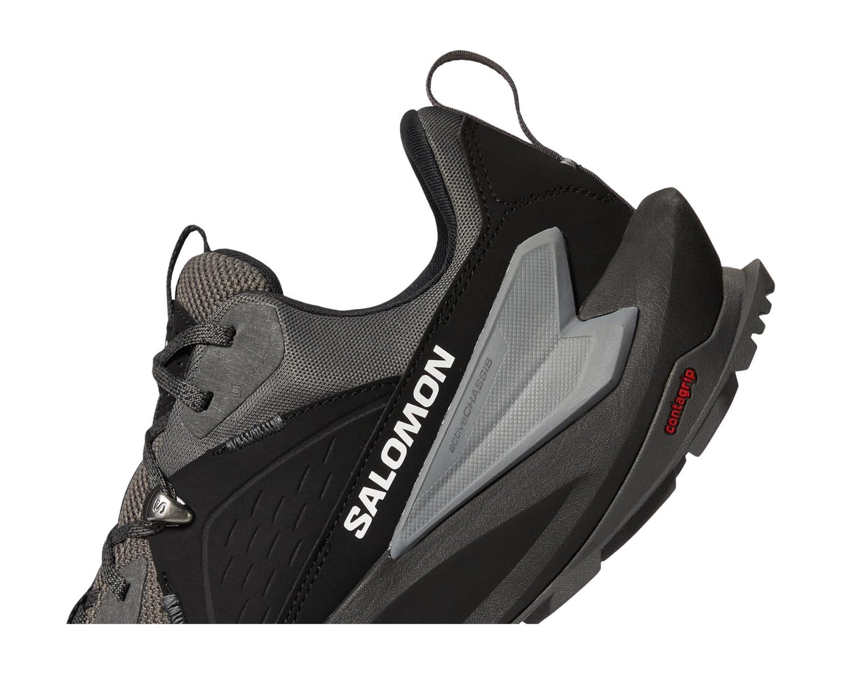Men's Salomon GORE-TEX® trail shoes, close-up of black/gray upper and side logo