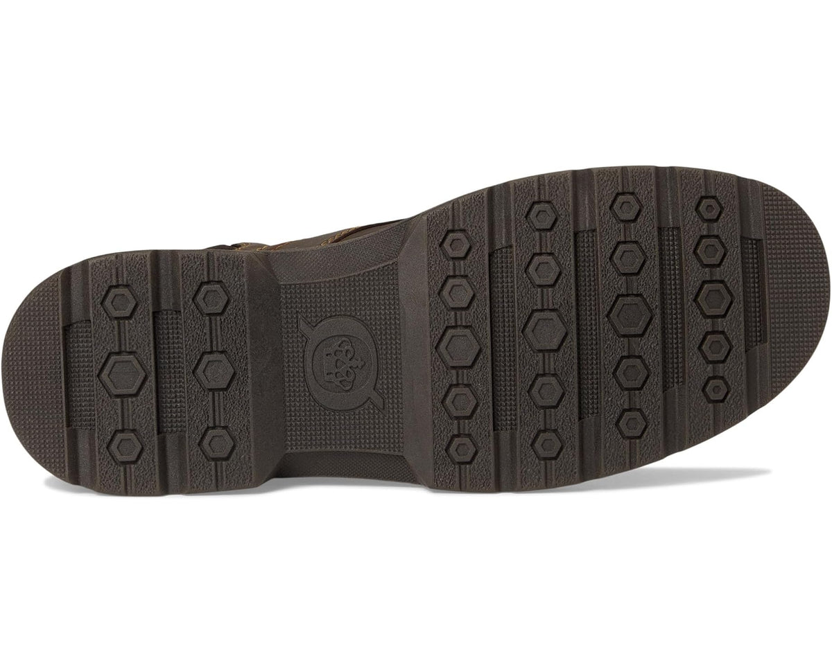 Brown rubber outsole with patterned traction tread for ankle boots