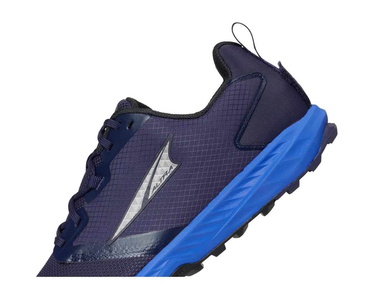 Side view of dark blue lace-up running shoe with Altra logo and blue sole edge.