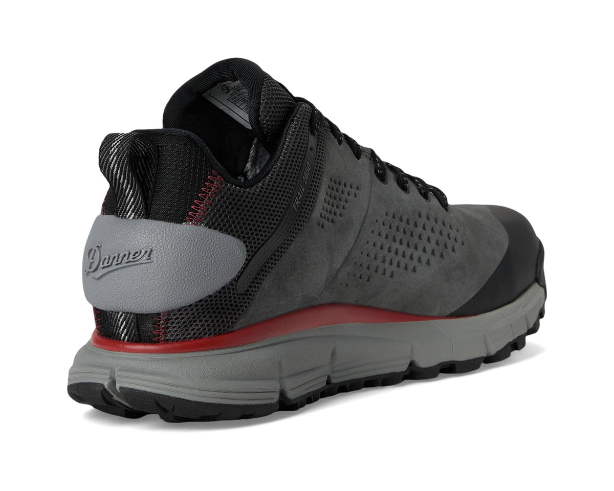 Grey suede hiking shoe with black mesh, red welt, and Danner logo on heel.