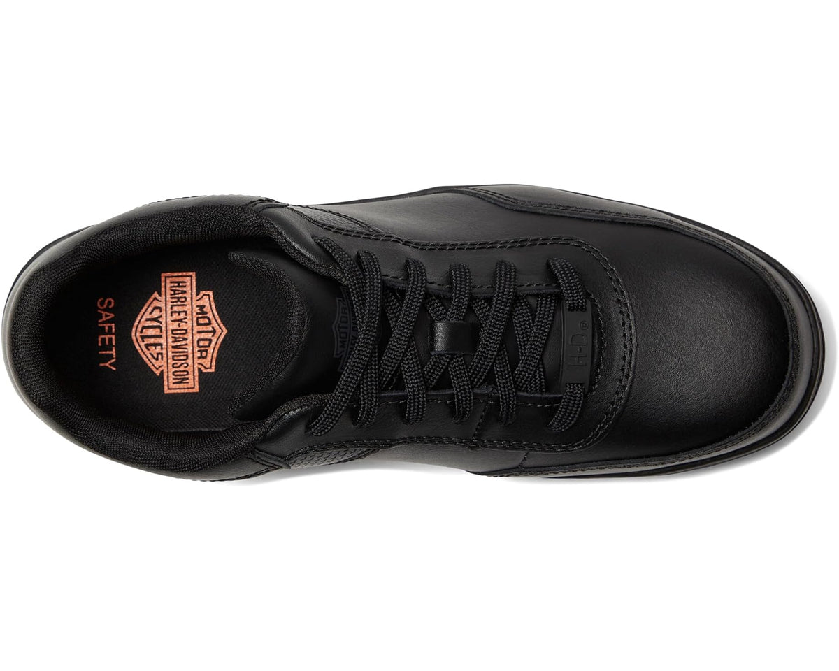Black sneaker showing lace-up vamp and tongue patch with Harley-Davidson branding