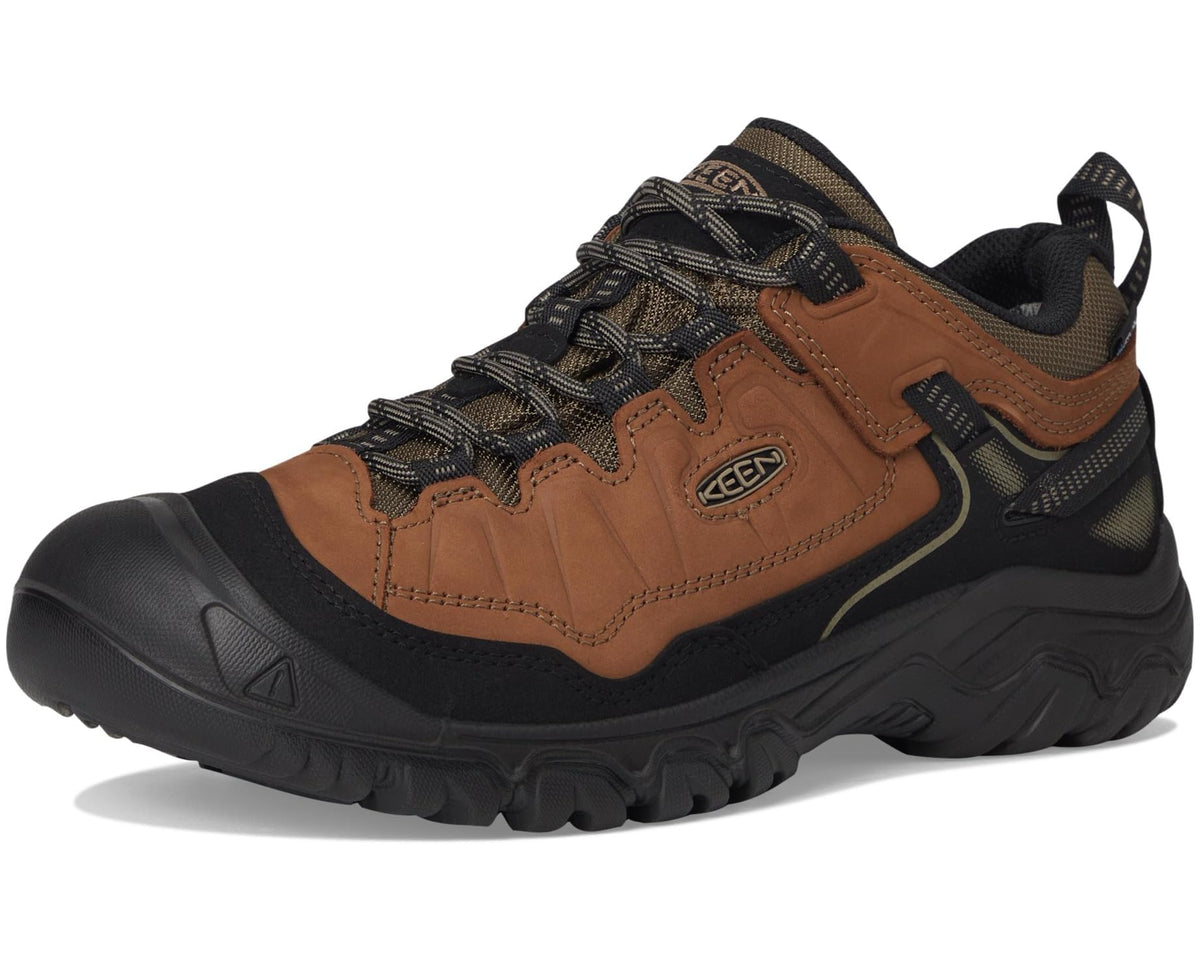 Men's mid hiking shoe front three-quarter view in brown with black heel and toe