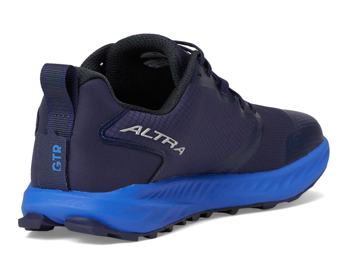 Heel view of dark blue running shoe with cushioned collar and GTR tab, Altra logo.