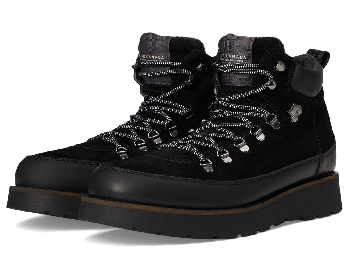 Black lace-up winter boots with faux-fur cuff and thick lug sole