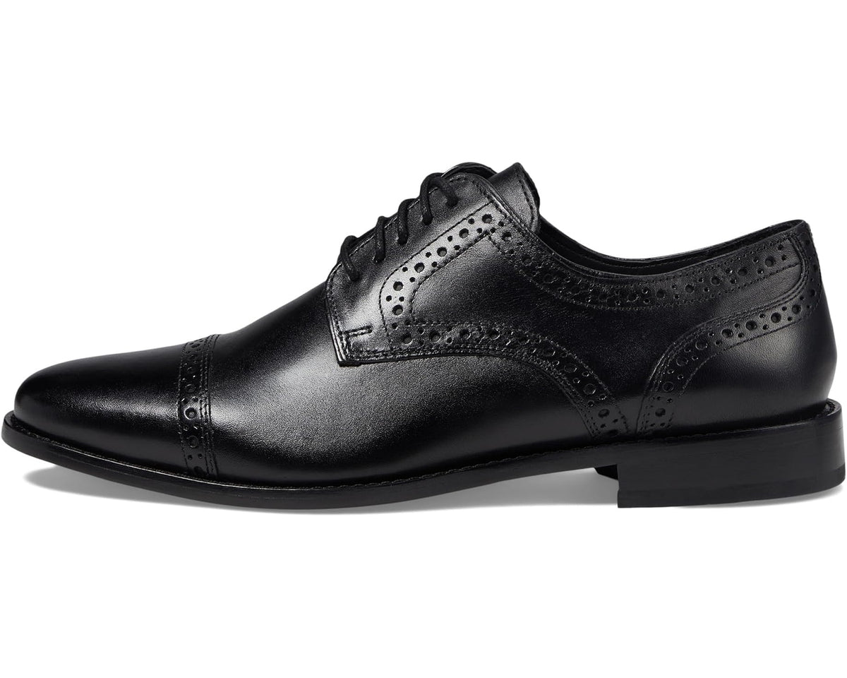 Black cap-toe lace-up Oxford dress shoes with perforated wingtip panels
