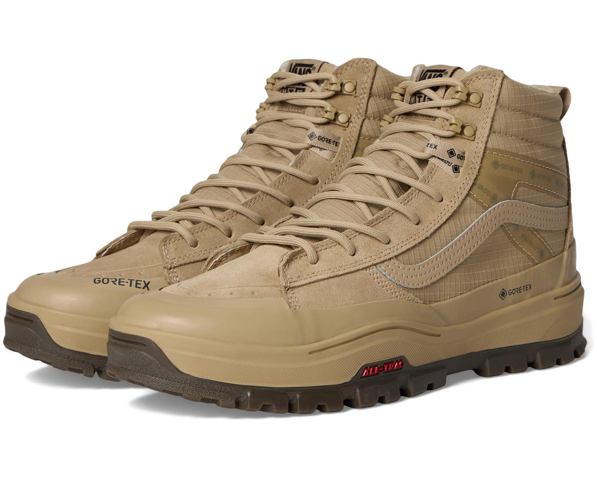 Beige unisex high-top lace-up boot with Gore-Tex and padded collar, textured rubber sole.