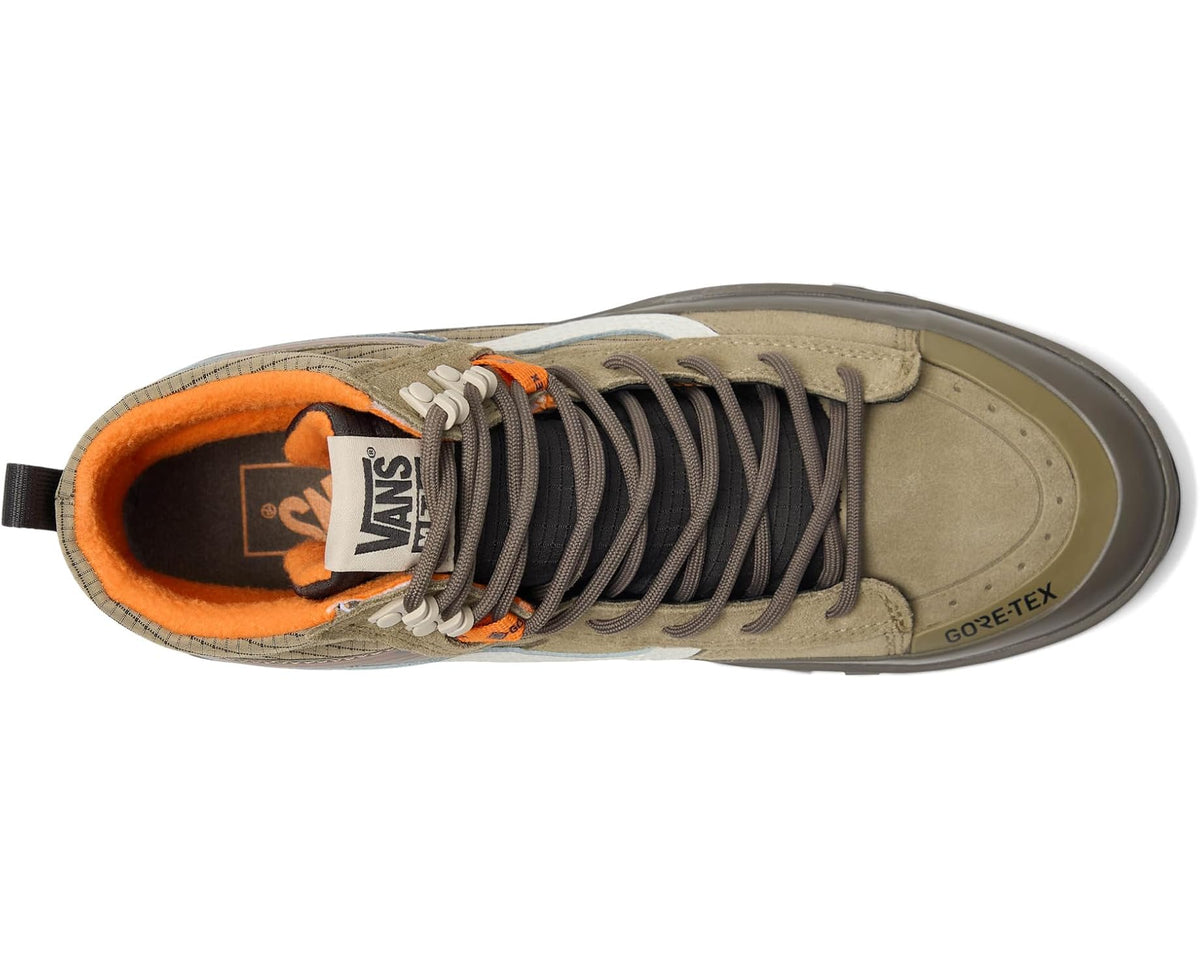 Brown and khaki high-top sneaker showing orange-lined tongue and gray lace-up