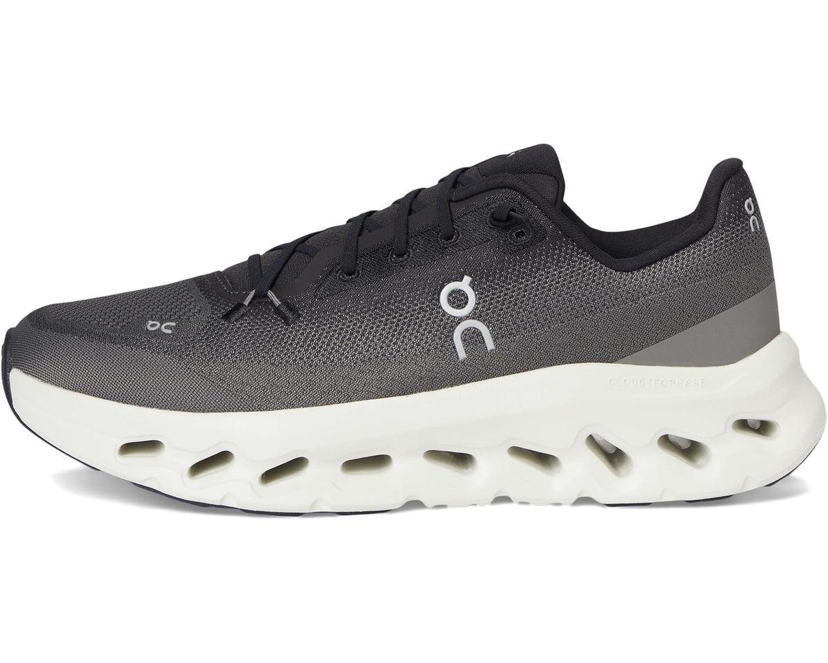 On Cloudtilt running shoes, side profile in dark asphalt knit with black laces