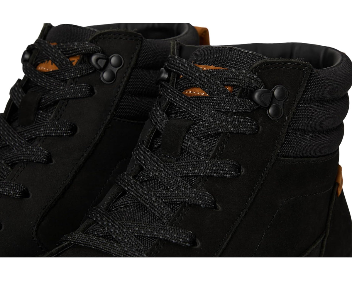 Sanuk black high-top shoe close-up with lace panel and orange detailing
