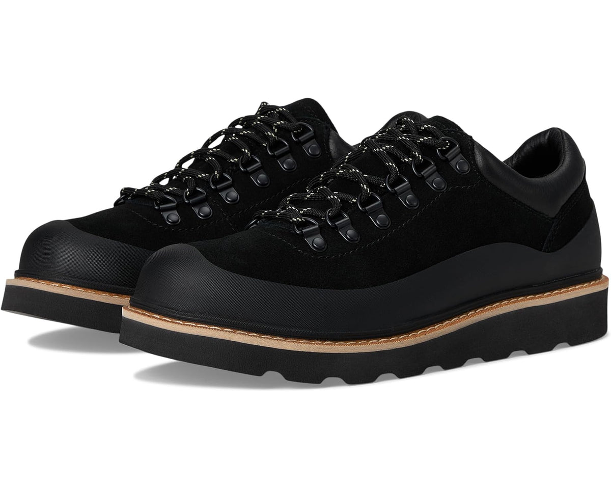 Men's black lace-up casual shoes with chunky rubber sole and tan edge trim