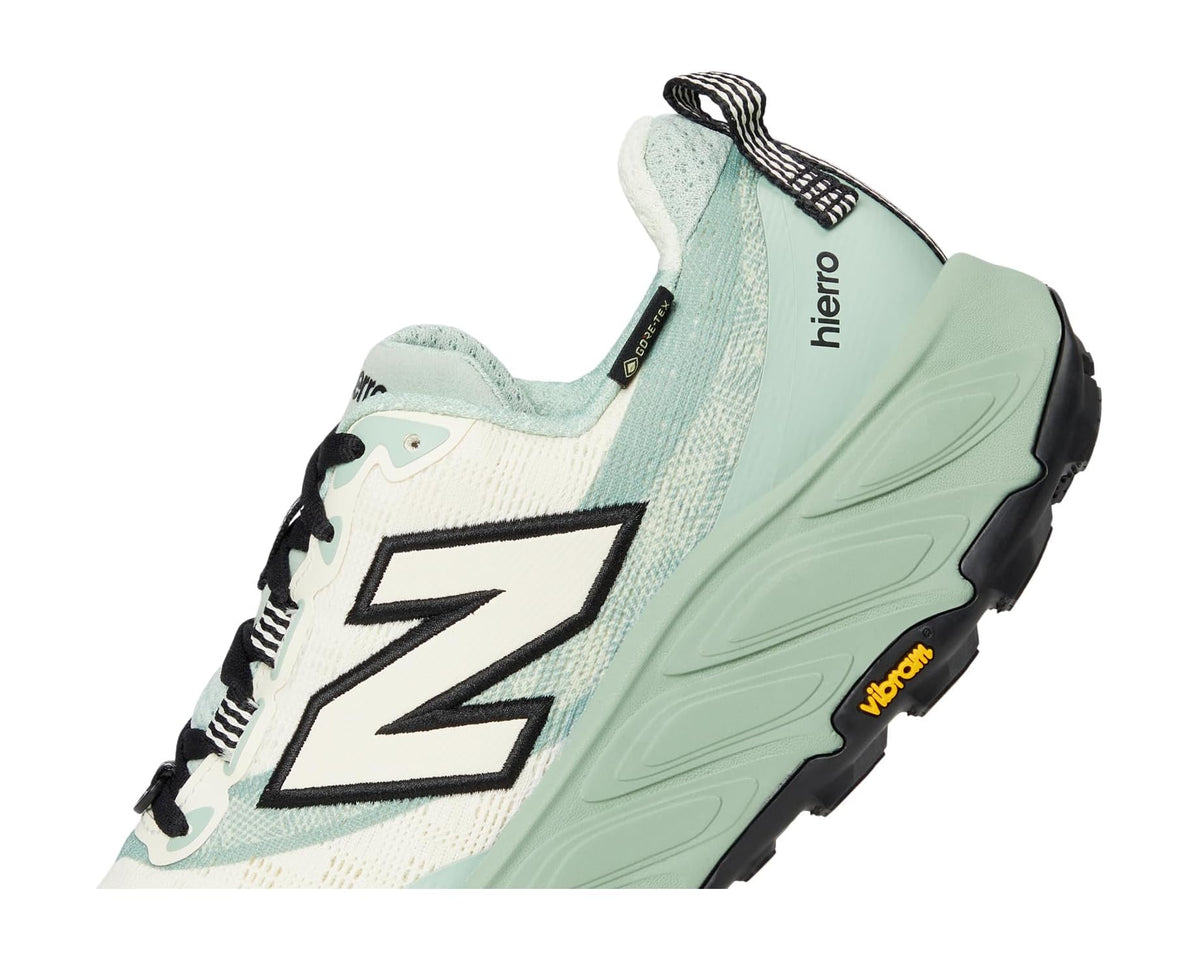 Men's New Balance trail shoes, heel side view with 'hierro' branding and black laces